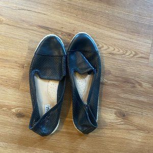 Target slip on, black holed shoes